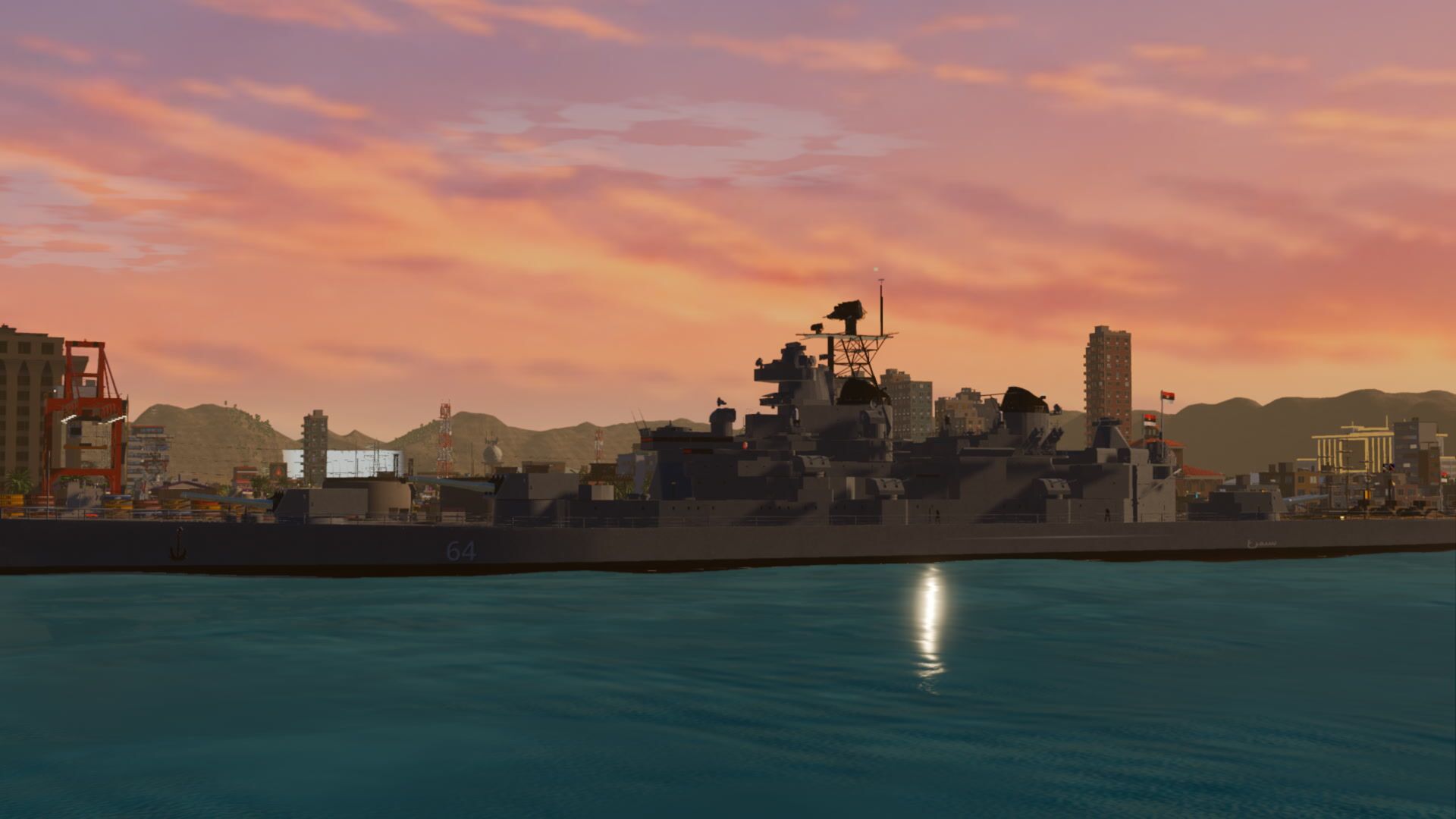 The battleship Simorgh at anchor off the coast at sunrise