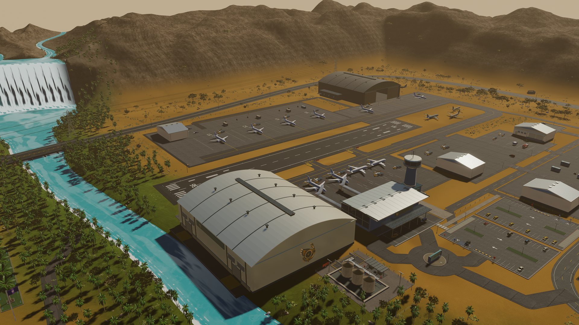 The civil airport terminal and hangars beside the river falls