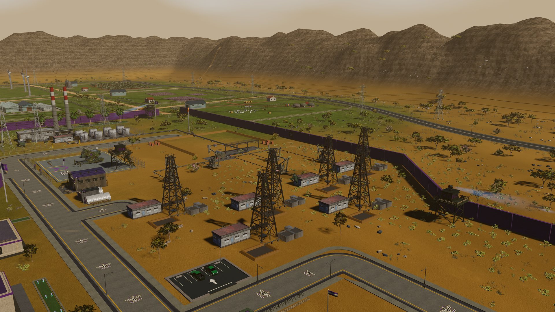 The Pars oil field: derricks and pump houses inside the perimeter fence