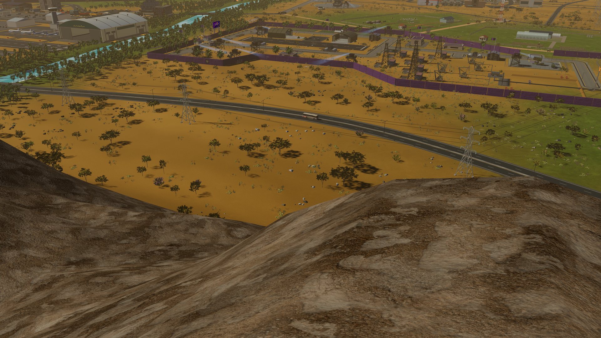 The foothills above the farm belt where the qanat line runs down