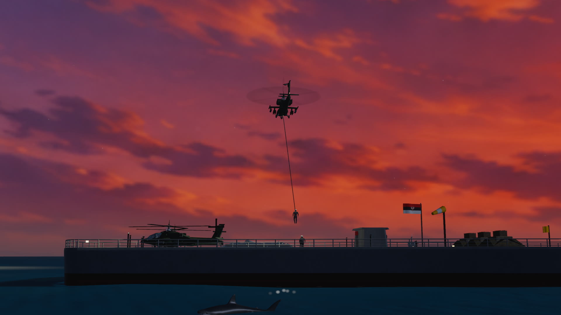 The gunship hovering over the Simorgh's stern at sunset, a load on the winch line